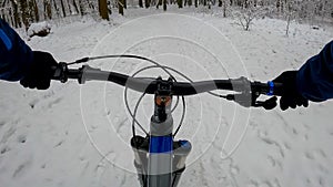 Amateur enduro rider on the bicycle in the winter season