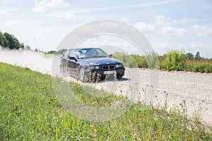 Amateur rally, dirt road, car with rider. Latvia 2018