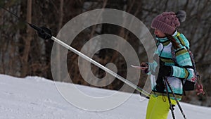 Amateur skier girl on a lift