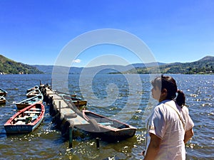 Amatitlan lake with boats offering tours in Guatemala photo