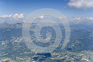 Amatrice lake among green slopes of hilly upland, Italy