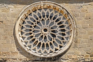 Amatrice - Rose window of the Sant'Agostino church photo