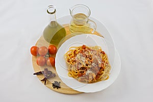 Amatriciana Pasta with its ingredients.