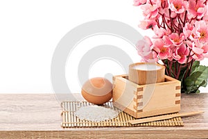 Amazake and egg isolated on white background