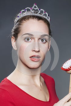 Amazed 20s beauty girl with dish brush in hand shocked