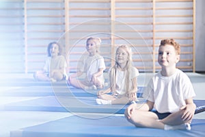 Amazed children in yoga classes