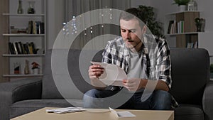 Amazed man reading good news on letter