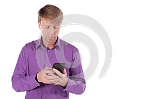 Amazed middle age man chatting on the phone on white background