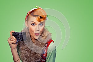 Amazed pinup style woman girl with digital camera