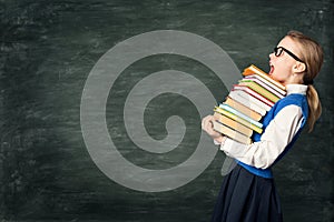 Amazed School Girl Holding Many Books, Astonished Strong Child Side View over Blackboard
