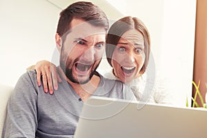 Amazed screaming couple