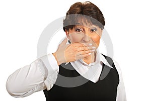 Amazed woman with hand over mouth