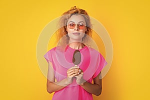 amazed woman with icelolly ice cream isolated on yellow. woman with icelolly ice cream in studio. woman with icelolly photo