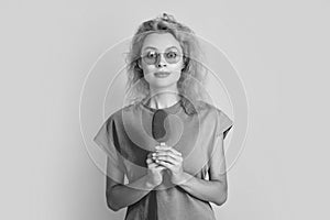 amazed woman with icelolly ice cream isolated on yellow. woman with icelolly ice cream in studio. woman with icelolly photo