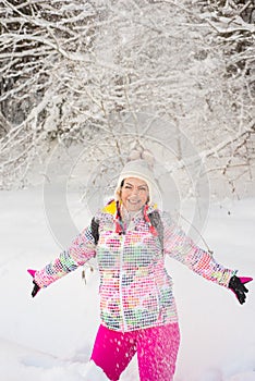 Amazed woman throw snow