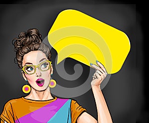 Amazed young sexy woman with open mouth looking up on empty yellow bubble.Thinking pop art girl