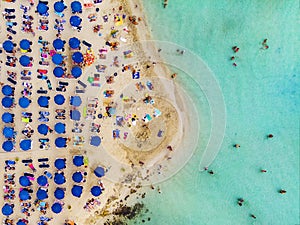 Amazing Aerial View from Above over Nissi Beach in Cyprus. Nissi Beach At high tide. Tourists relax on the beach. Crowded beach photo