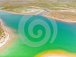 Amazing aerial view of bright green water lake in Bogdo-Baskunchak