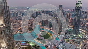 Amazing aerial view of Dubai downtown skyscrapers day to night timelapse, Dubai, United Arab Emirates