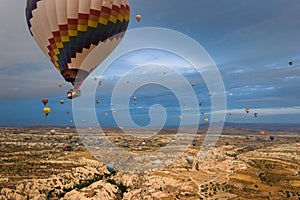 Amazing aerial view of hot air balloons at sunrise in Goreme National Park. Cappadocia.Turkey.