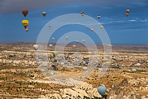 Amazing aerial view of hot air balloons at sunrise in Goreme National Park. Cappadocia.Turkey.