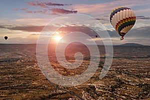 Amazing aerial view of hot air balloons at sunrise in Goreme National Park. Cappadocia.Turkey.