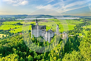 Amazing aerial view on Neuschwanstein Fairytale Castle at sunny summer day, Bavaria, Germany