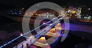 An amazing aerial view of Night fairytale Bridge before Christmas, Uzhgorod, Ukraine