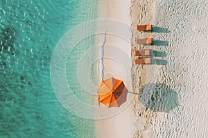 Amazing aerial view of paradise beach landscape with loungers and umbrella close to amazing tropic sea