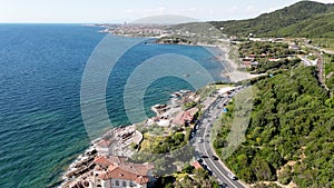 Amazing aerial view of Tuscany coastline in Calafuria area, Italy. Slow motion