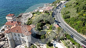 Amazing aerial view of Tuscany coastline in Calafuria area, Italy. Slow motion