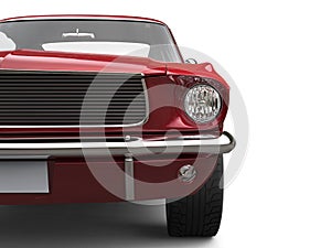 Amazing American vintage muscle car - cherry red - front view closeup cut shot