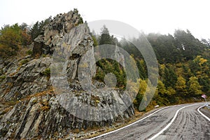 Amazing autumn morning view of foggy Transfagarasan road in Transylvania, Romania