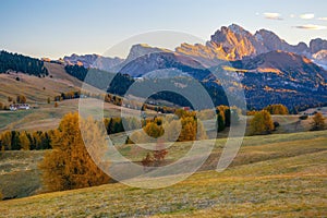 Amazing autumn scenery of Alpe di Siusi at sunrise, Dolomite Alps, Italy