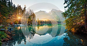 Amazing autumn sunrise of Hintersee lake. Picturesque morning view of Bavarian Alps on the Austrian border, Germany, Europe.