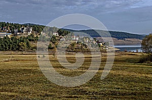 Amazing autumn view holiday village around Tsigov chark resort and Batak dam reservoir, Rhodope mountains