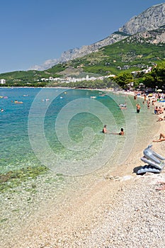 Amazing beach with people in Tucepi, Croatia