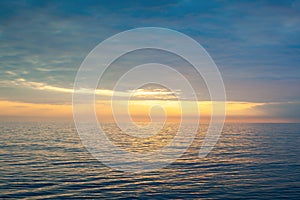 Amazing beach sunset with endless horizon. Horizontal. Selective focus.