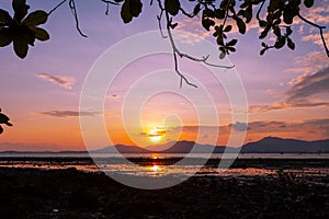 Amazing Beautiful Light of nature Dramatic sky seascape in sunset or sunrise scenery background with leaves frame in the