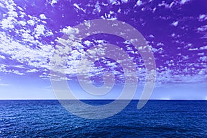 Amazing Beautiful Sunset Sunrise View With Violet Sky. Calm Sea Ocean And Dramatic Sky Background. Very Peri. Bright