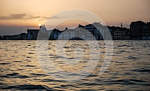 Amazing beautiful sunset at Venetian lagoon.