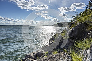 Amazing beauty  sunset on Baltic sea on blue sky with clouds. Beautiful summer nature backgrounds.