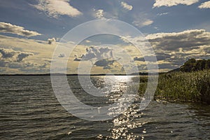 Amazing beauty  sunset on Baltic sea on blue sky with white clouds.