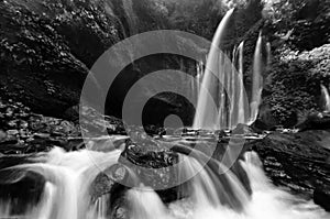 Amazing black & white Beautiful scenery of Tiu Kelep waterfall in senaru, indonesia.