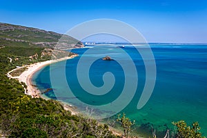 Amazing blue water beach in ArrÃÂ¡bida, Alentejo in Portugal photo