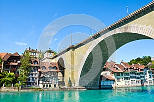 Amazing bridge construction over turquoise Aare River in Bern, Switzerland. Photographed in summer in the Swiss capital.