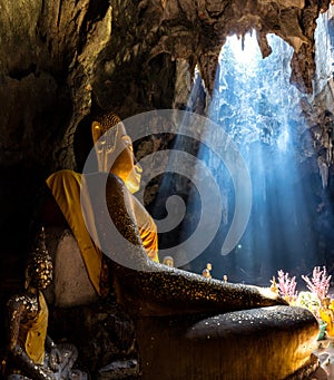 Amazing Buddhism with the ray of light in the cave