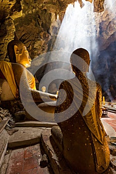 Amazing Buddhism with the ray of light in the cave