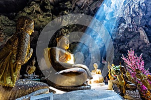 Amazing Buddhism with the ray of light in the cave