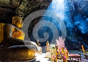 Amazing Buddhism with the ray of light in the cave